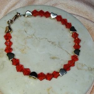 Red and gold beaded bracelet